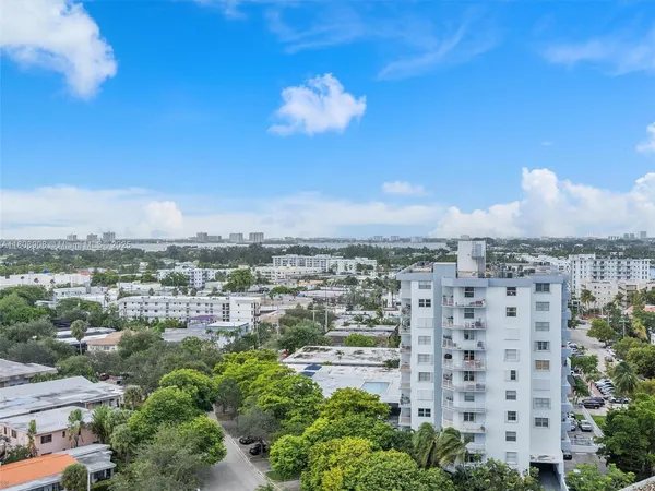 a view of a city with tall buildings