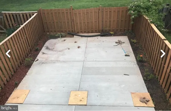 a view of a house that has a large window