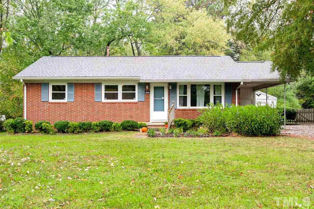 4608 Revere Road Durham, NC 27713 - Photo 1 of 29 a front view of house with yard and green space