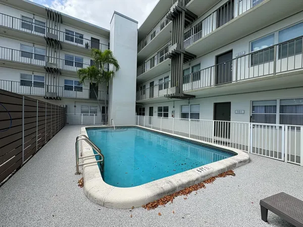 a view of outdoor space and swimming pool