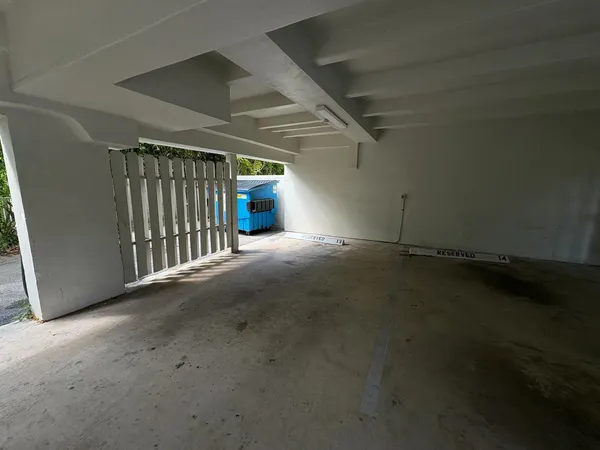 a view of an empty room with stairs