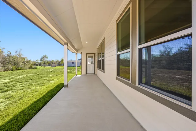 a view of a balcony with ocean view