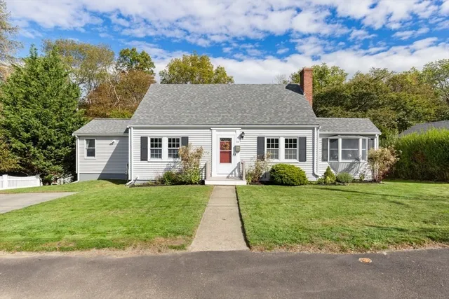 front view of a house and a yard
