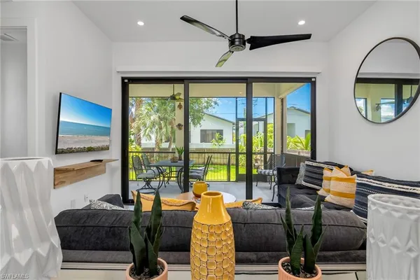 a living room with furniture and a window