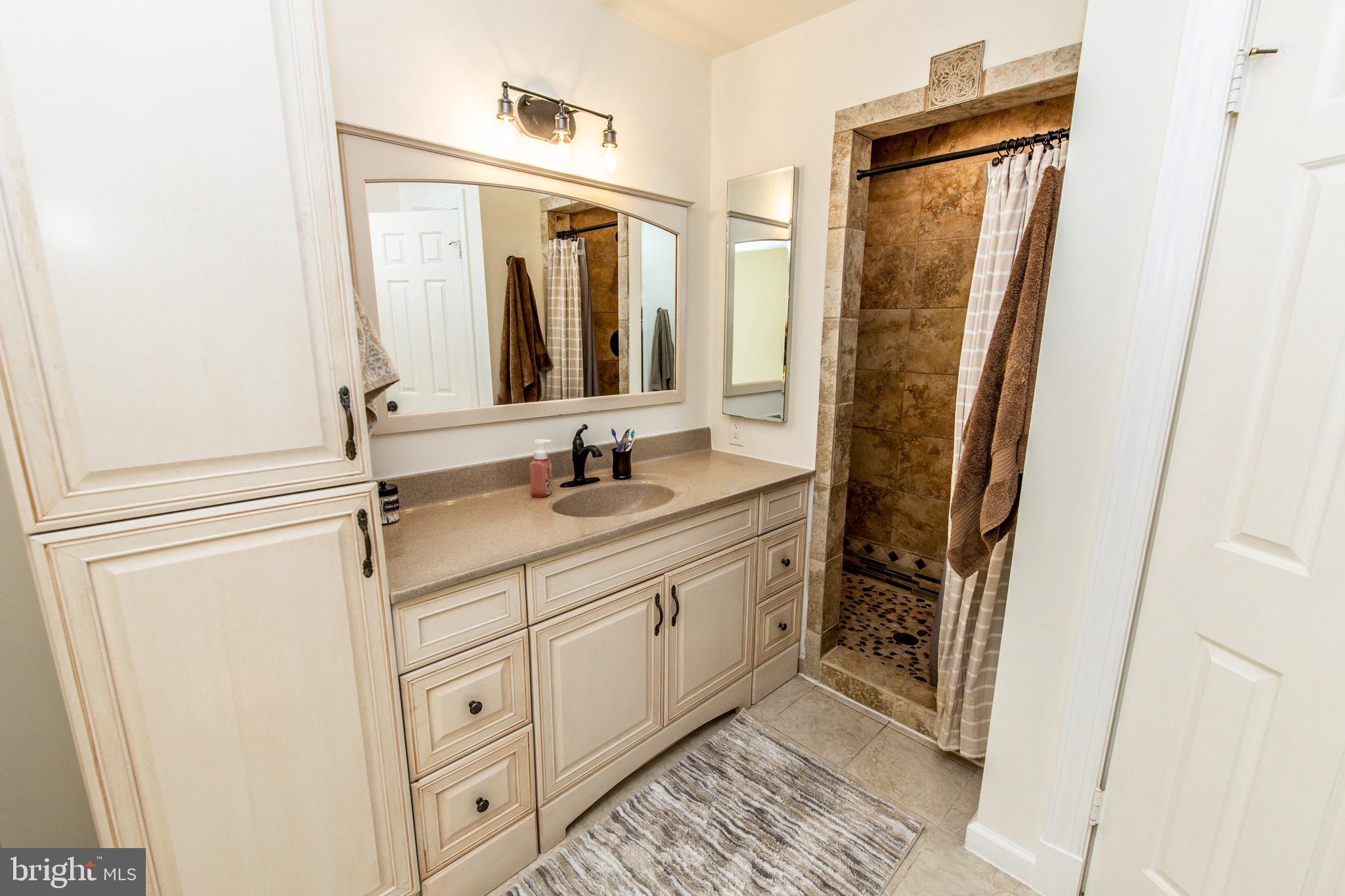 525 Post Oak Road Annapolis, MD 21401 - Photo 41 of 92 Primary bathroom first vanity & shower