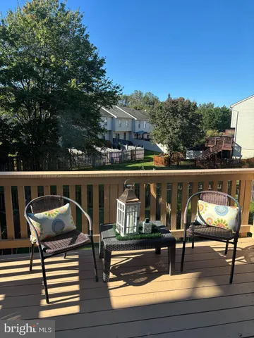 a view of balcony with a potted plant