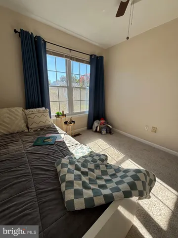an empty room with a view of a bathroom
