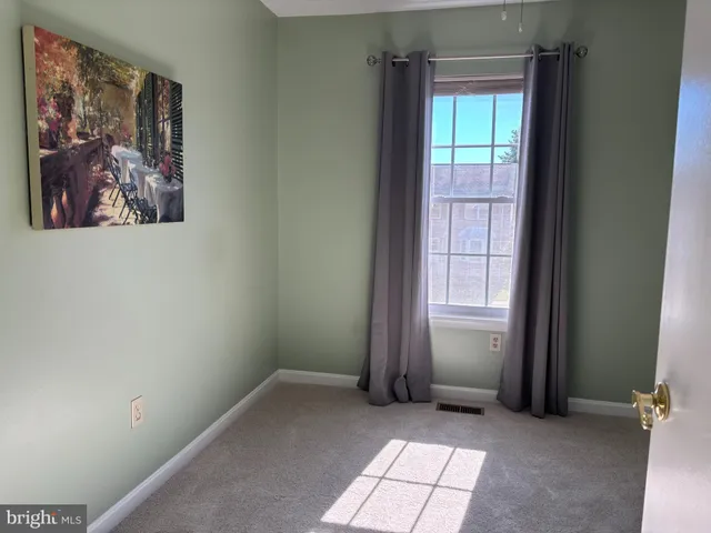 a bathroom with a toilet a sink and shower