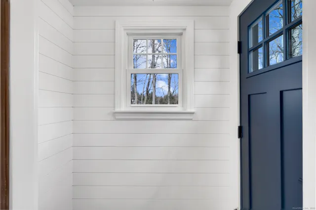 a bathroom with a window and a window