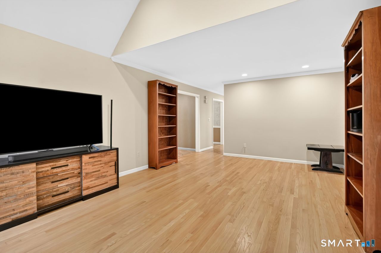 104 Old Farms Road Glastonbury, CT 06073 - Photo 21 of 40 a view of a livingroom with furniture and staircase