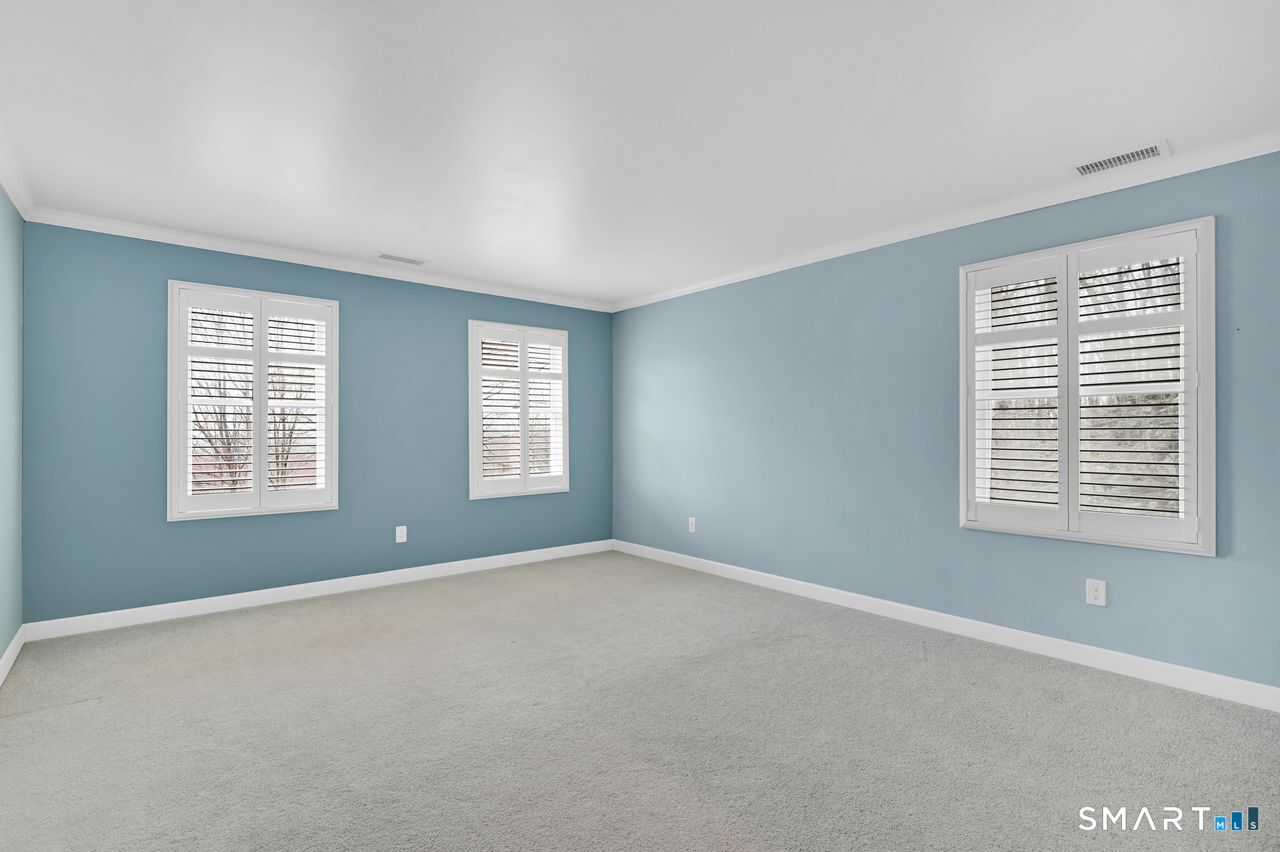 104 Old Farms Road Glastonbury, CT 06073 - Photo 23 of 40 a view of an empty room with a window