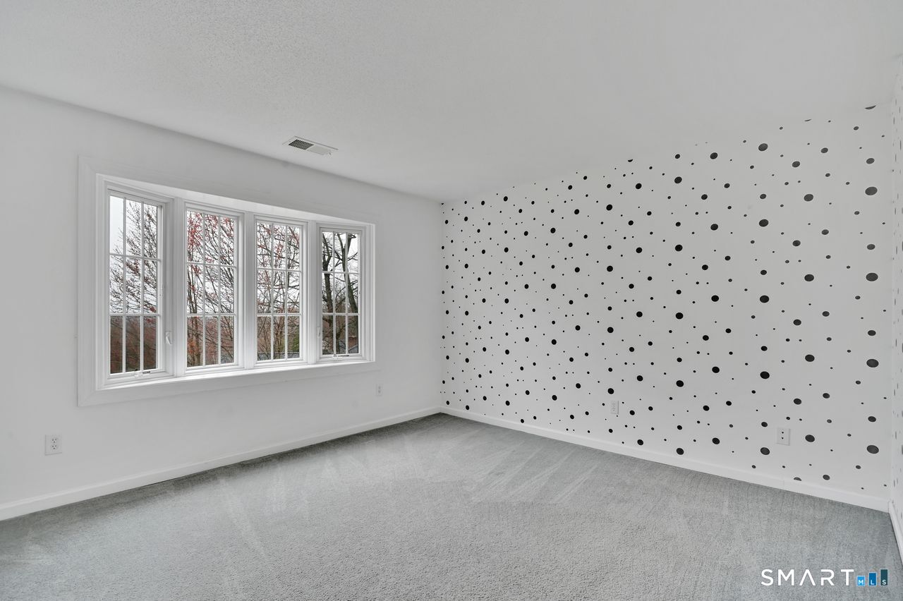 104 Old Farms Road Glastonbury, CT 06073 - Photo 28 of 40 a view of an empty room and window