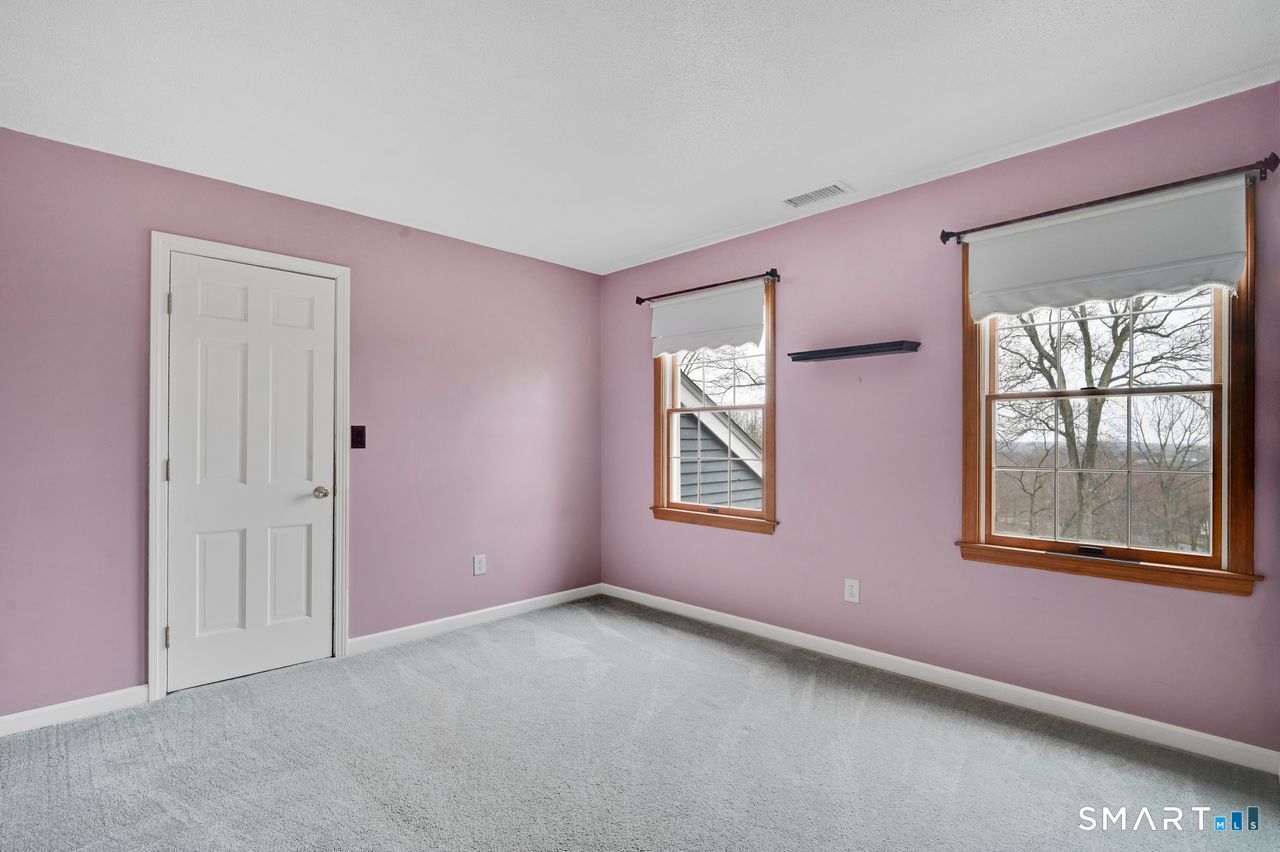 104 Old Farms Road Glastonbury, CT 06073 - Photo 30 of 40 an empty room with windows