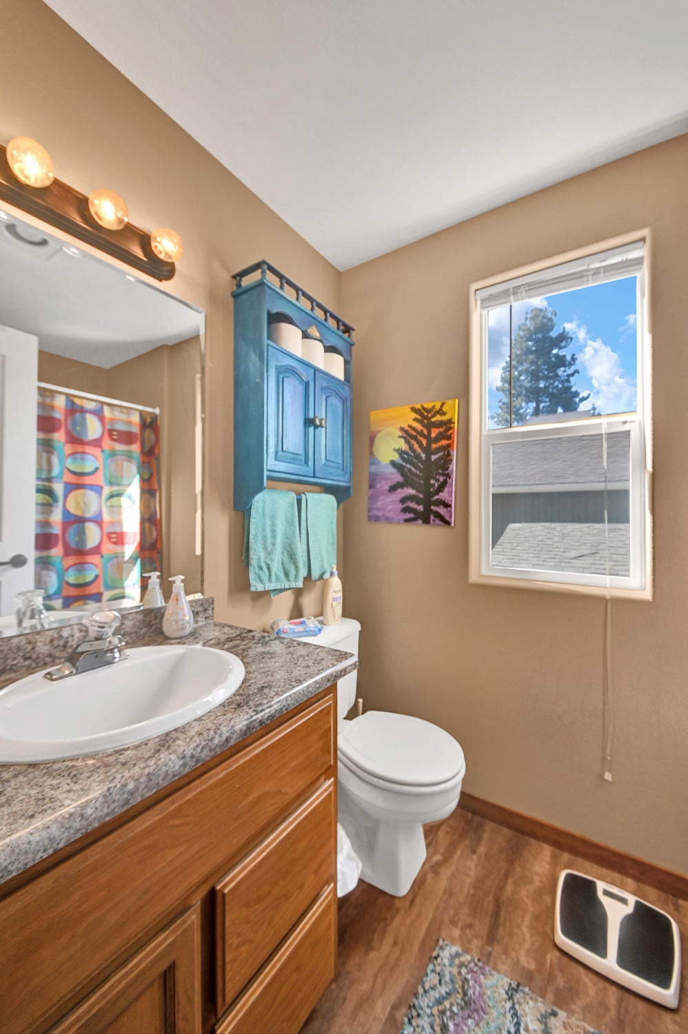 1142 Northeast Ross Road Bend, OR 97701 - Photo 18 of 30 Updated second full bath, new sink, new flooring.