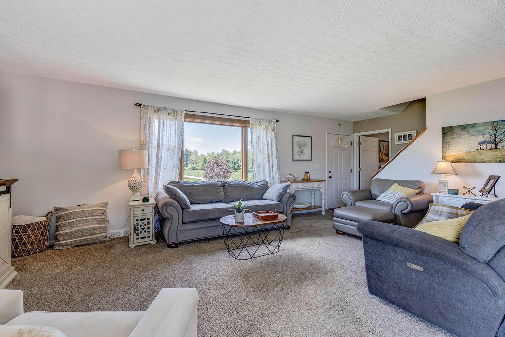 1300 Hubbard Road Galloway, OH 43119 - Photo 9 of 89 • New light sand carpet ~ 2016 • Grey painted walls • Drapes are negotiable • New Pella® windows ~ 2021