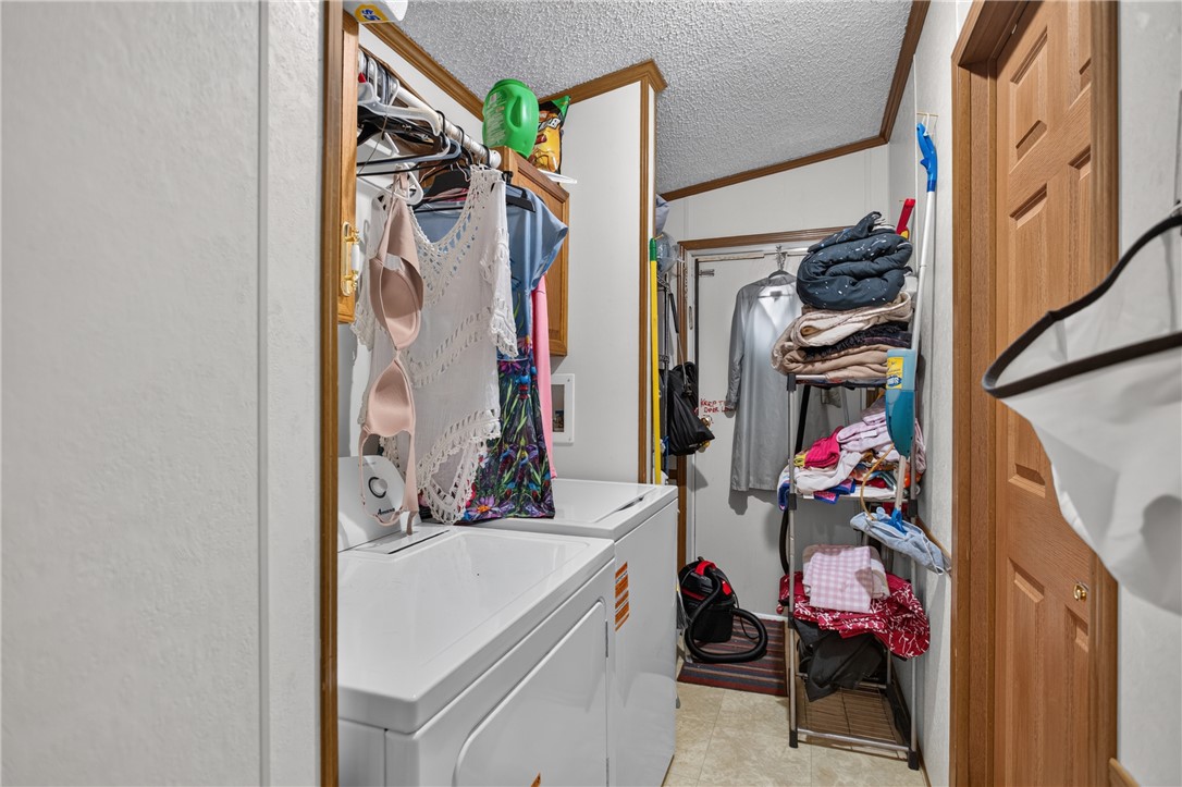 418 Chauga Road Westminster, SC 29693 - Photo 11 of 38 Functional laundry area featuring modern appliances for effortless living.
