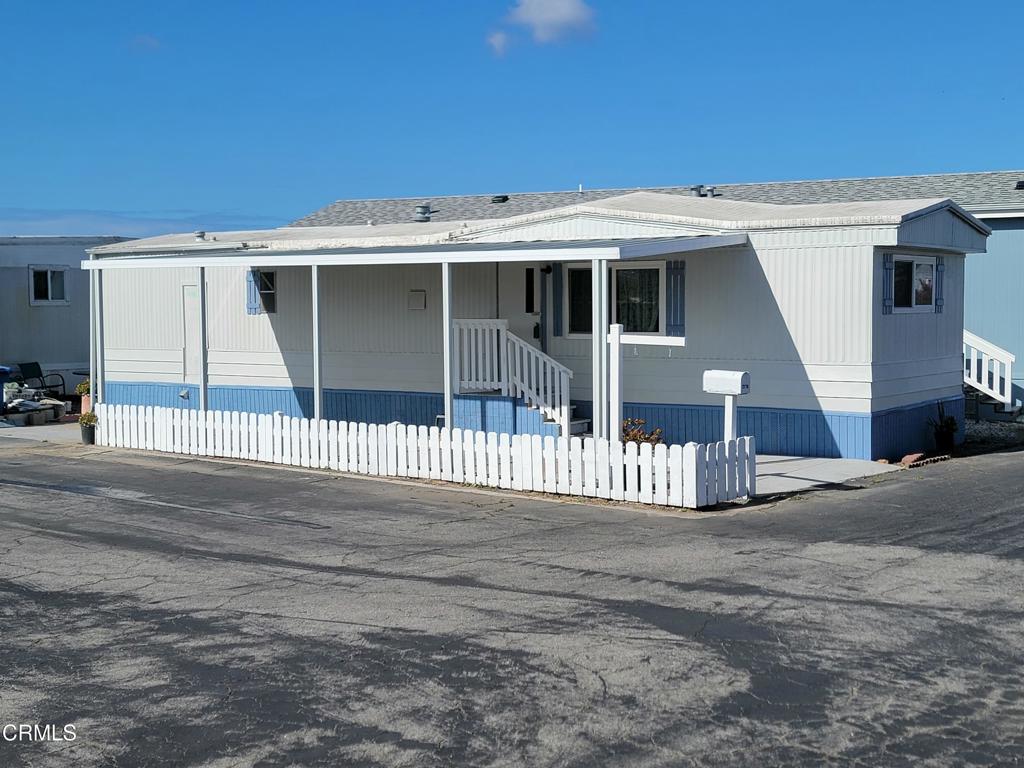 2178 Thrush Avenue, Unit J Oxnard, CA 93033 - Photo 3 of 12 a view of a house with a outdoor space