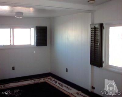 2178 Thrush Avenue, Unit J Oxnard, CA 93033 - Photo 9 of 12 a view of an empty room and window