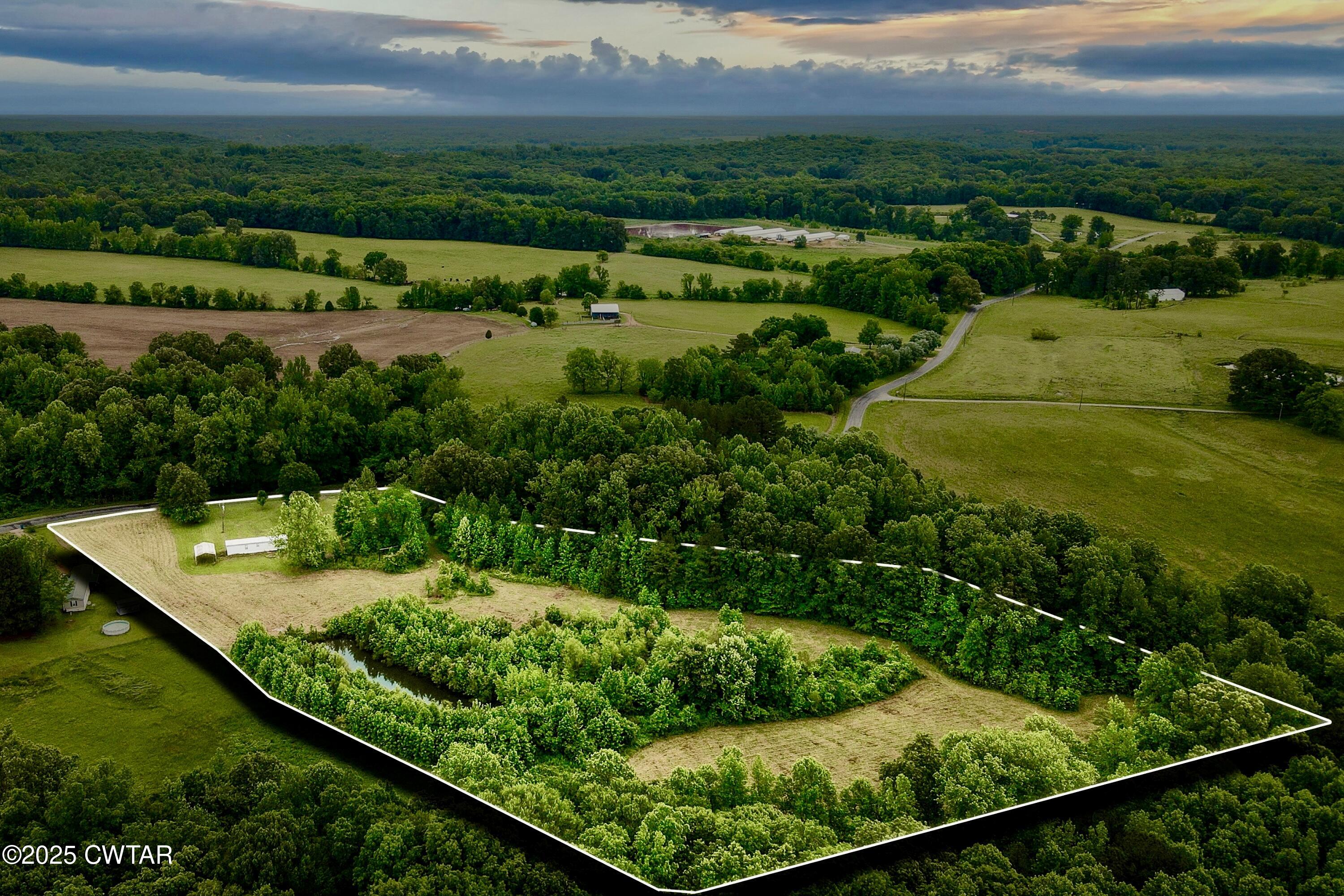 1124 Jim Merrill Road Paris, TN 38242 - Photo 1 of 17 a view of a city