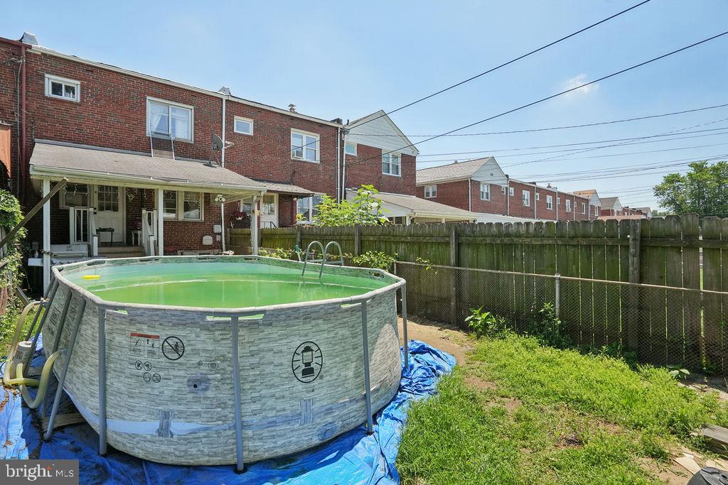 1918 Church Road Baltimore, MD 21222 - Photo 26 of 29 a view of a house with a swimming pool