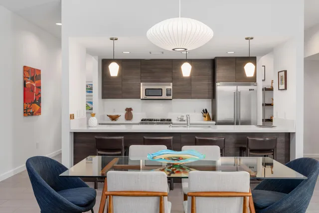 a view of kitchen with cabinets