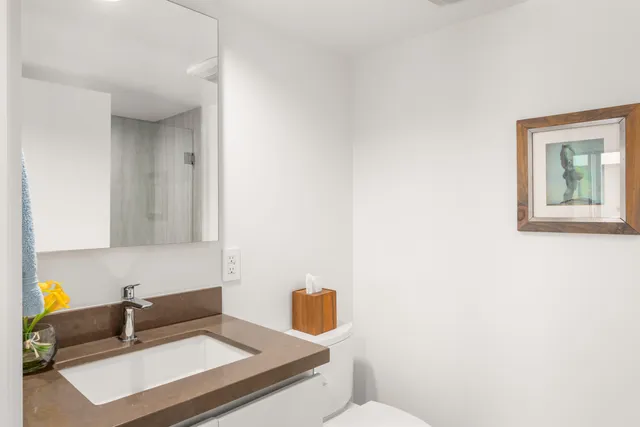 a bathroom with a sink and a toilet