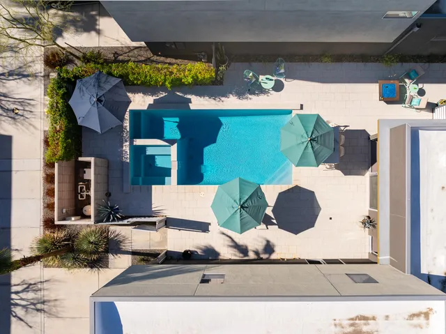 a picture of a table and chairs in the patio