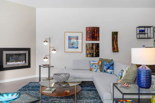 a living room with furniture and a couch