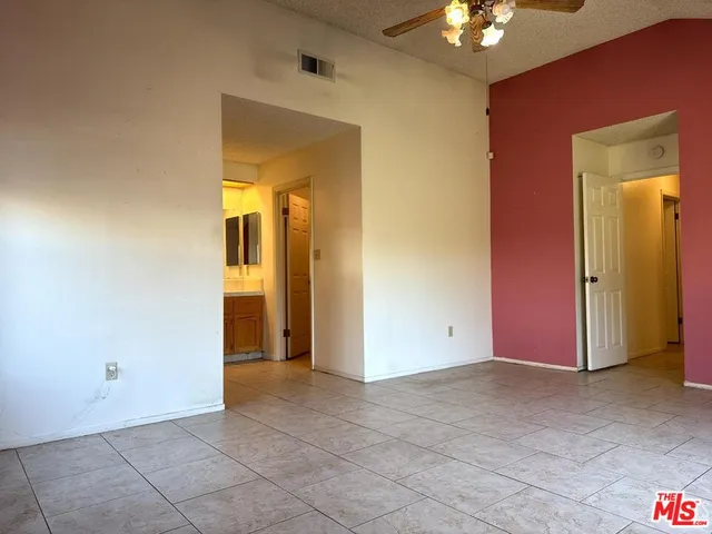 a bathroom with a shower and a toilet