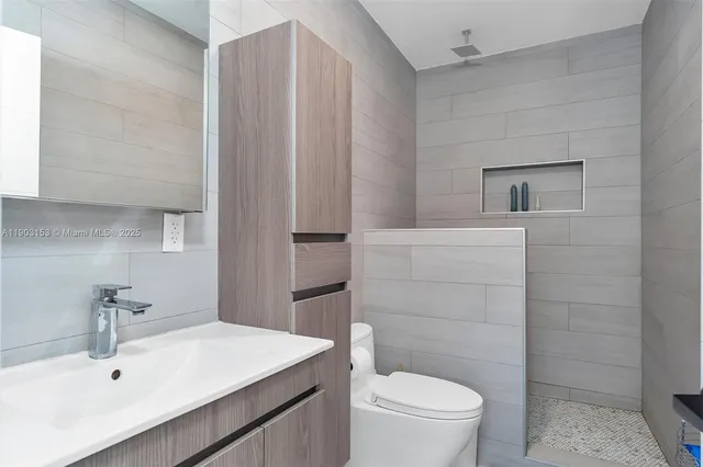 a bedroom with a workspace