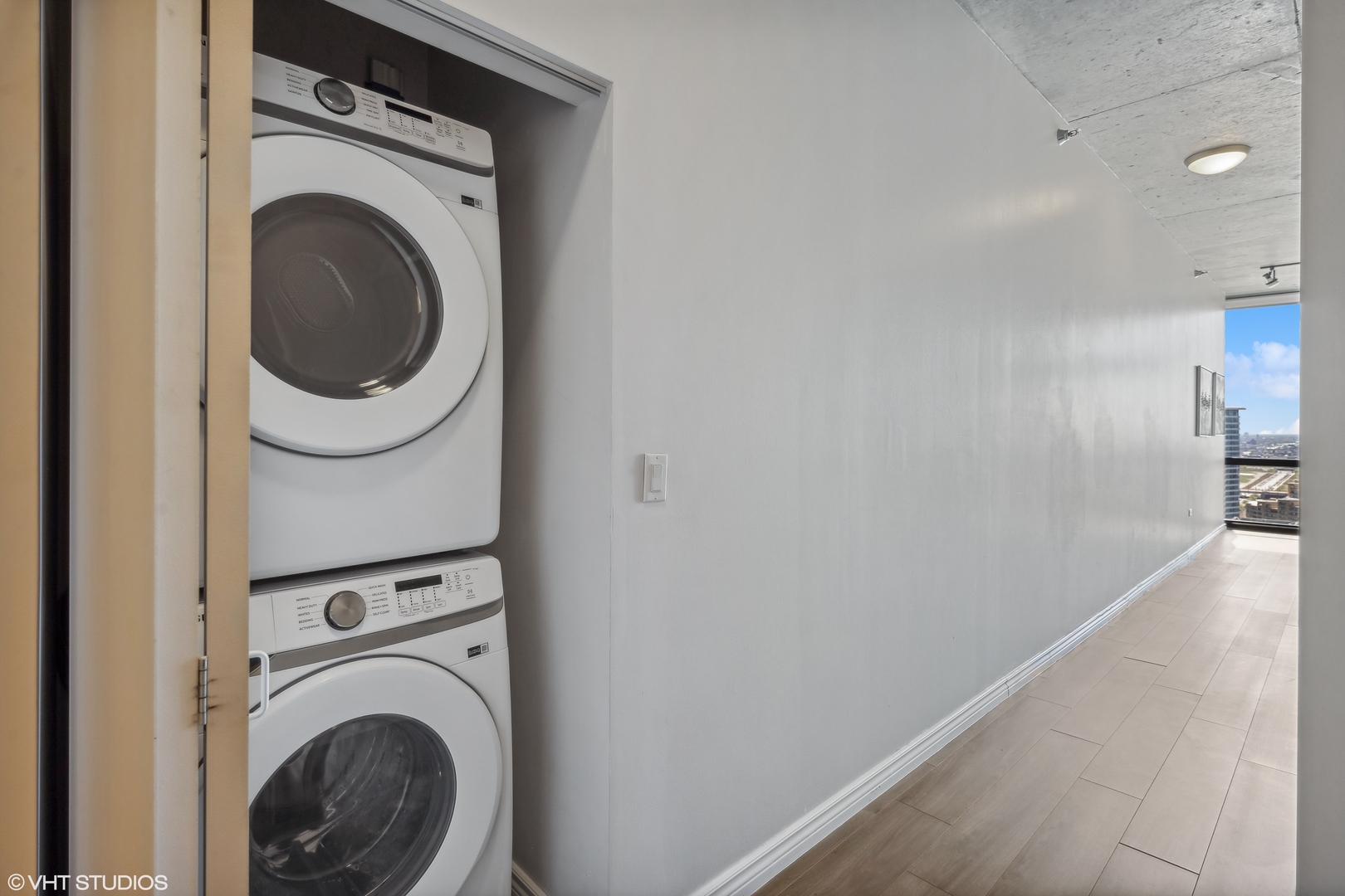 235 West Van Buren Street, Unit 2708 Chicago, IL 60607 - Photo 8 of 10 a close up view of a washer and dryer