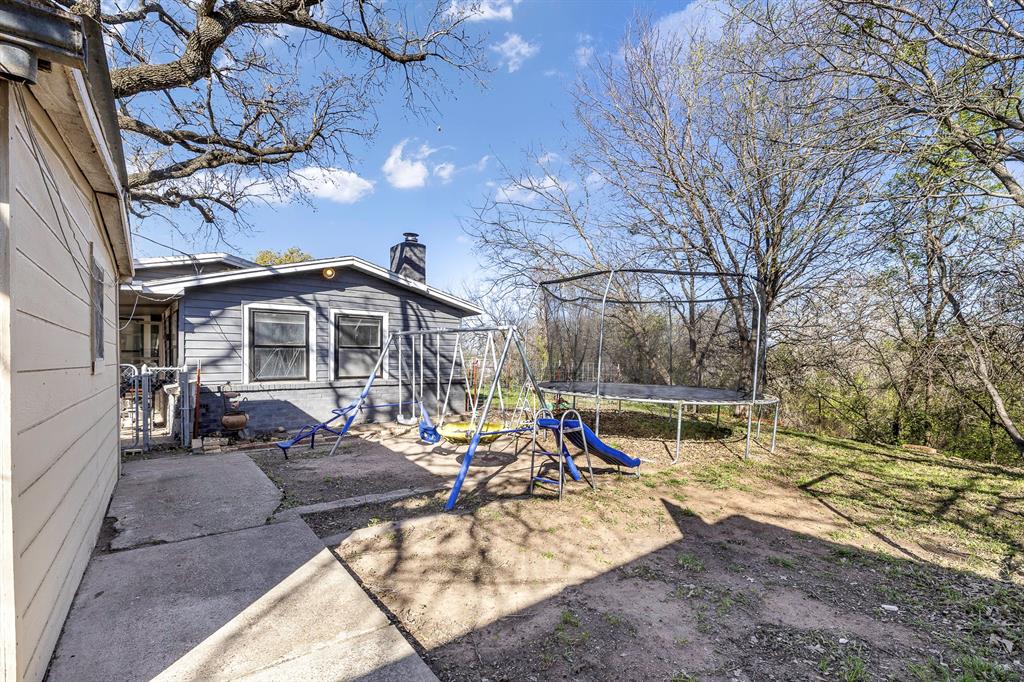 132 Maple Dublin, TX 76446 - Photo 22 of 27 a view of a park with iron fence