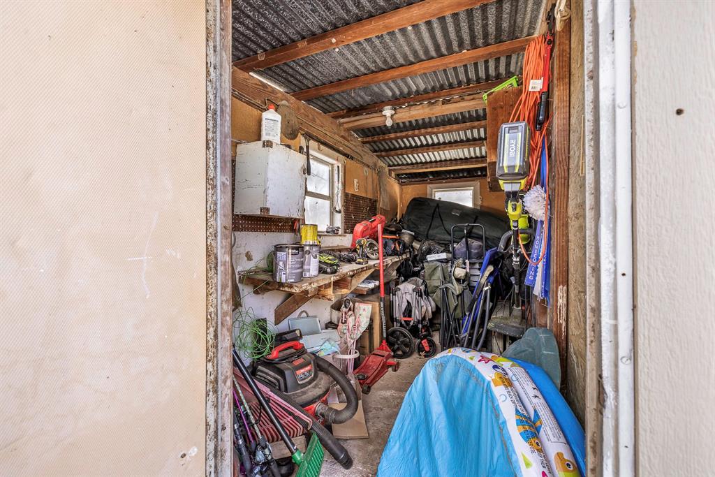 132 Maple Dublin, TX 76446 - Photo 27 of 27 a view of walk in closet with clothes