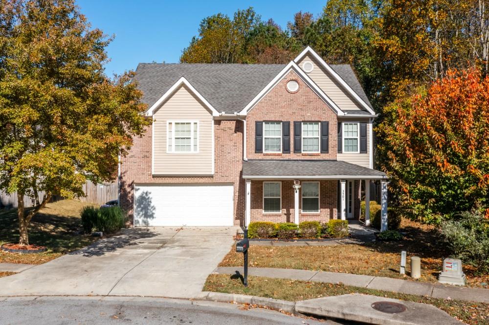 3501 Bogan Mill Road Northeast Buford, GA 30519 - Photo 2 of 59 front view of a house