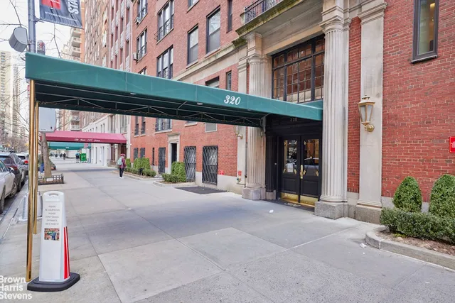 a view of a building with a porch
