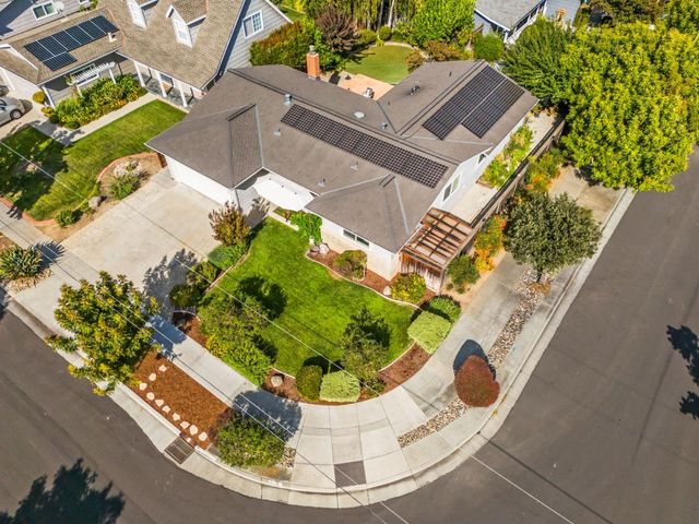a view of a swimming pool with sitting area