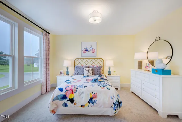 a bathroom with a sink mirror toilet and shower