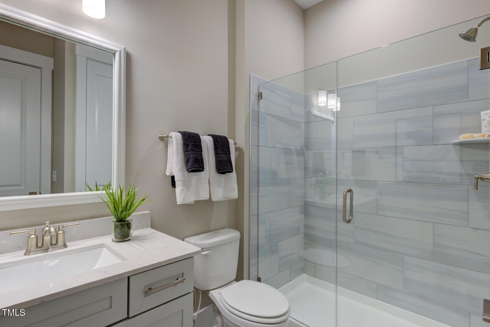 149 Brandy Mill Pittsboro, NC 27312 - Photo 20 of 69 a bathroom with a sink a toilet and shower