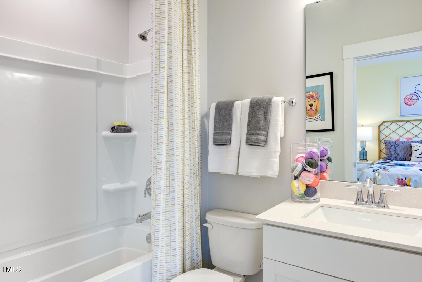 149 Brandy Mill Pittsboro, NC 27312 - Photo 21 of 69 a bathroom with a sink mirror toilet and shower