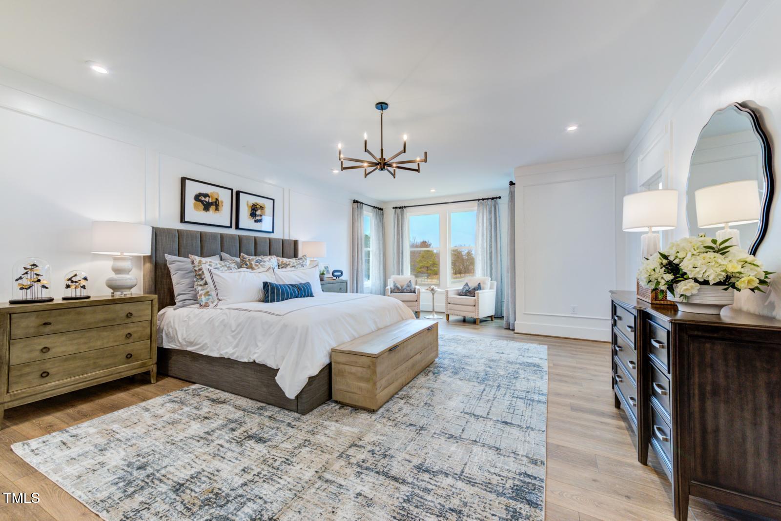 149 Brandy Mill Pittsboro, NC 27312 - Photo 27 of 69 a spacious bedroom with a bed and a dresser