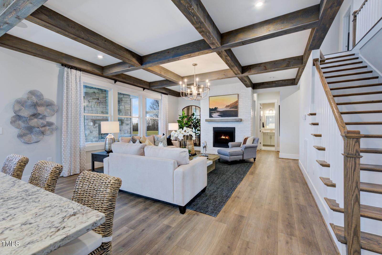 149 Brandy Mill Pittsboro, NC 27312 - Photo 54 of 69 a living room with furniture and a fireplace