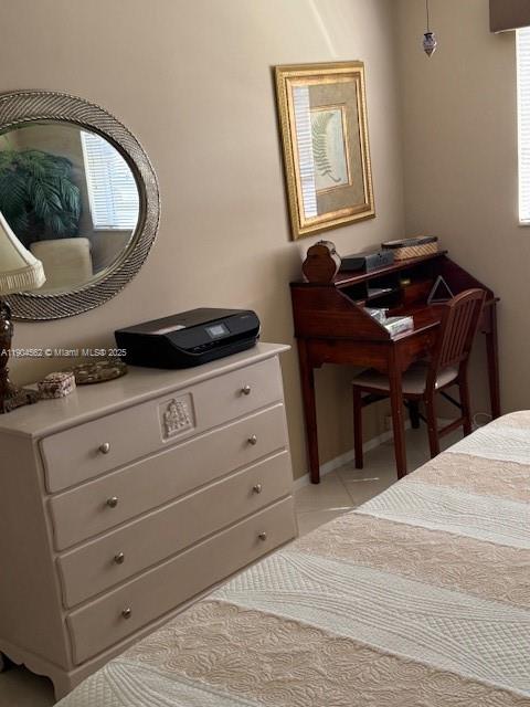 5300 Washington Street, Unit P136 Hollywood, FL 33021 - Photo 12 of 21 a room with a bed and a mirror on dresser
