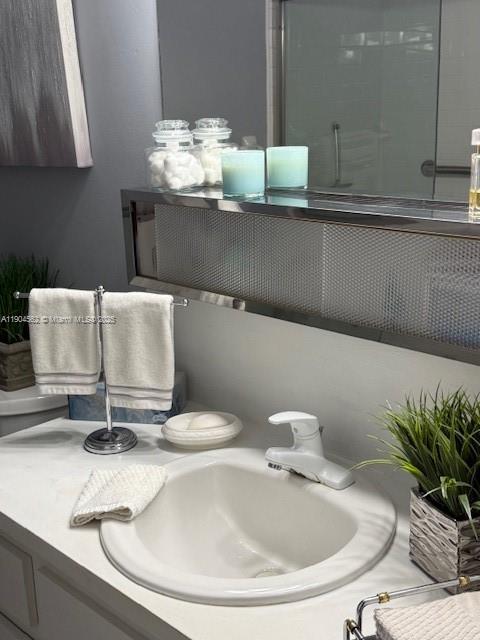 5300 Washington Street, Unit P136 Hollywood, FL 33021 - Photo 15 of 21 a bathroom with a sink and a mirror