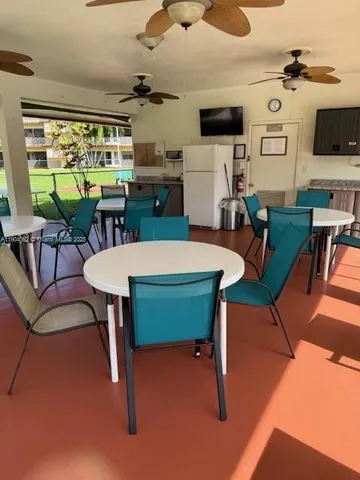 a view of a yard and patio