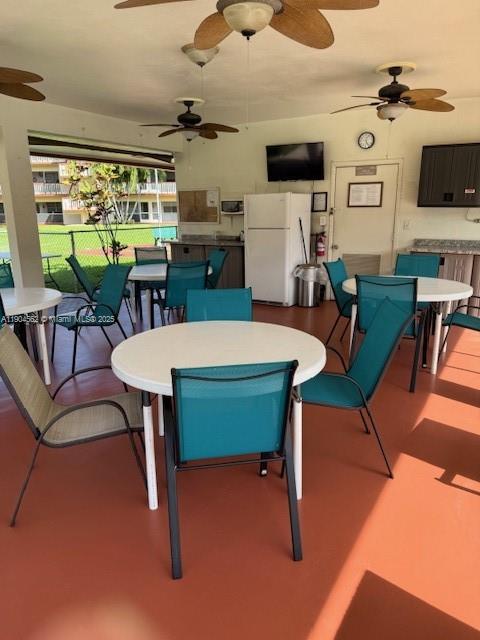 5300 Washington Street, Unit P136 Hollywood, FL 33021 - Photo 19 of 21 a view of a dining room with furniture window and outside view