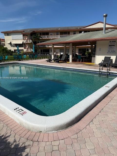 5300 Washington Street, Unit P136 Hollywood, FL 33021 - Photo 20 of 21 a view of a yard and patio