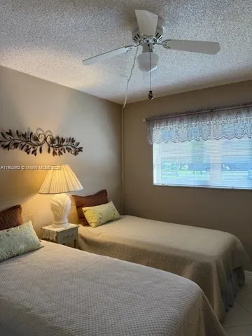 a bedroom with a bed and walk in closet