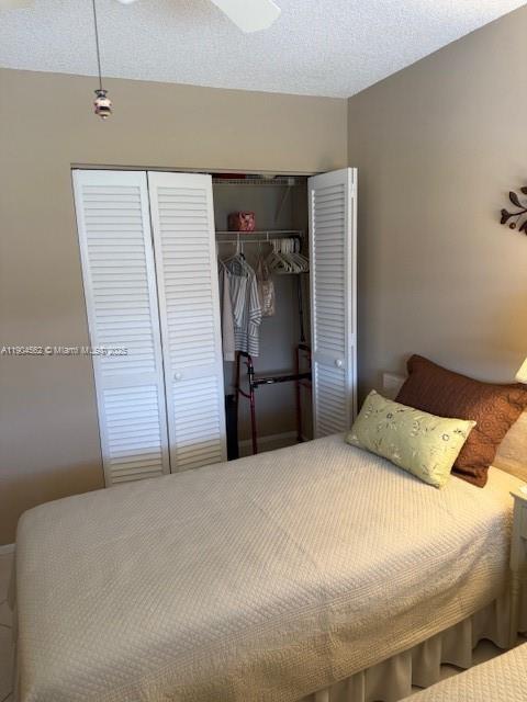 5300 Washington Street, Unit P136 Hollywood, FL 33021 - Photo 10 of 21 a bedroom with a bed and walk in closet
