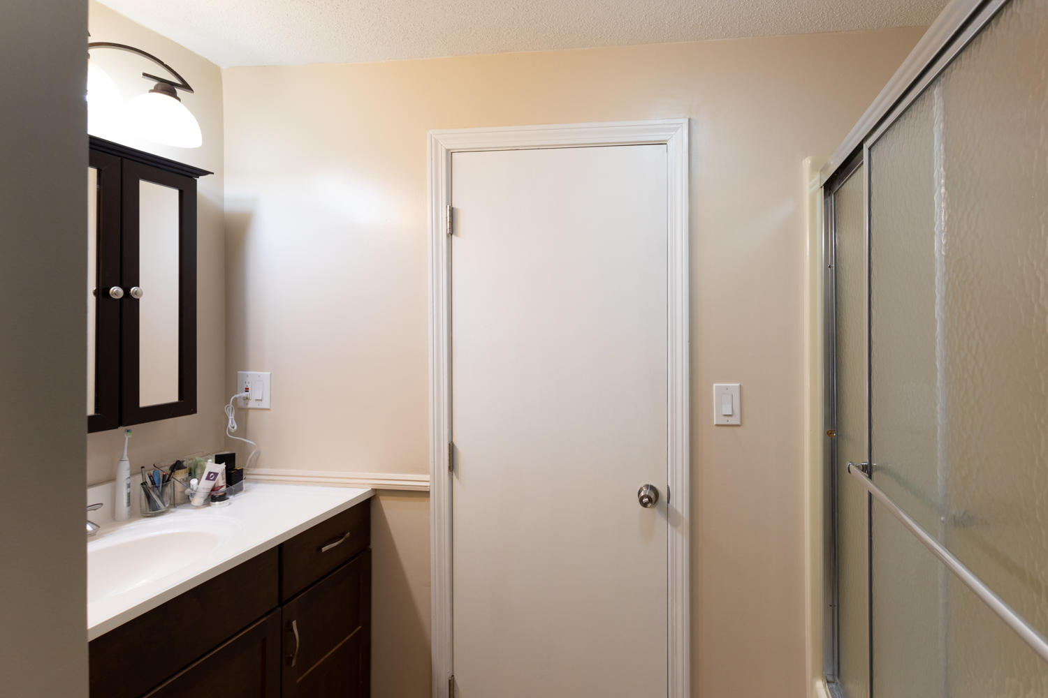 104 Goose Point Road Centerville, MA 02601 - Photo 25 of 41 a bathroom with a sink a toilet and mirror