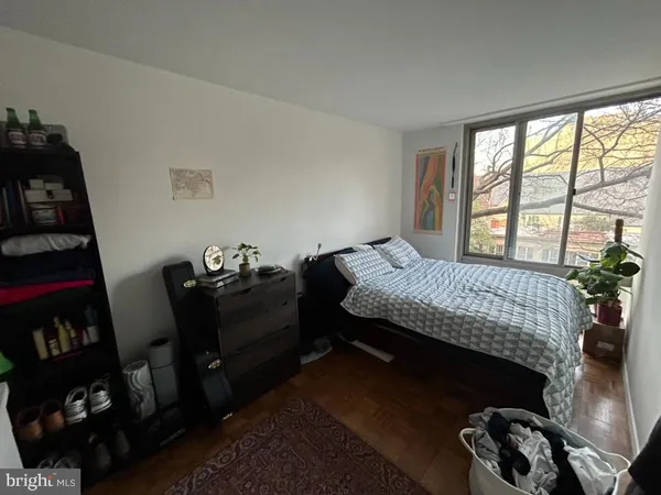 a view of a balcony with wooden floor